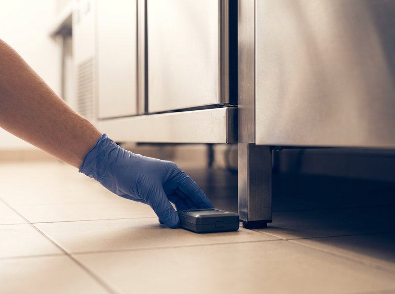 Monitoring station under a stainless prep counter
